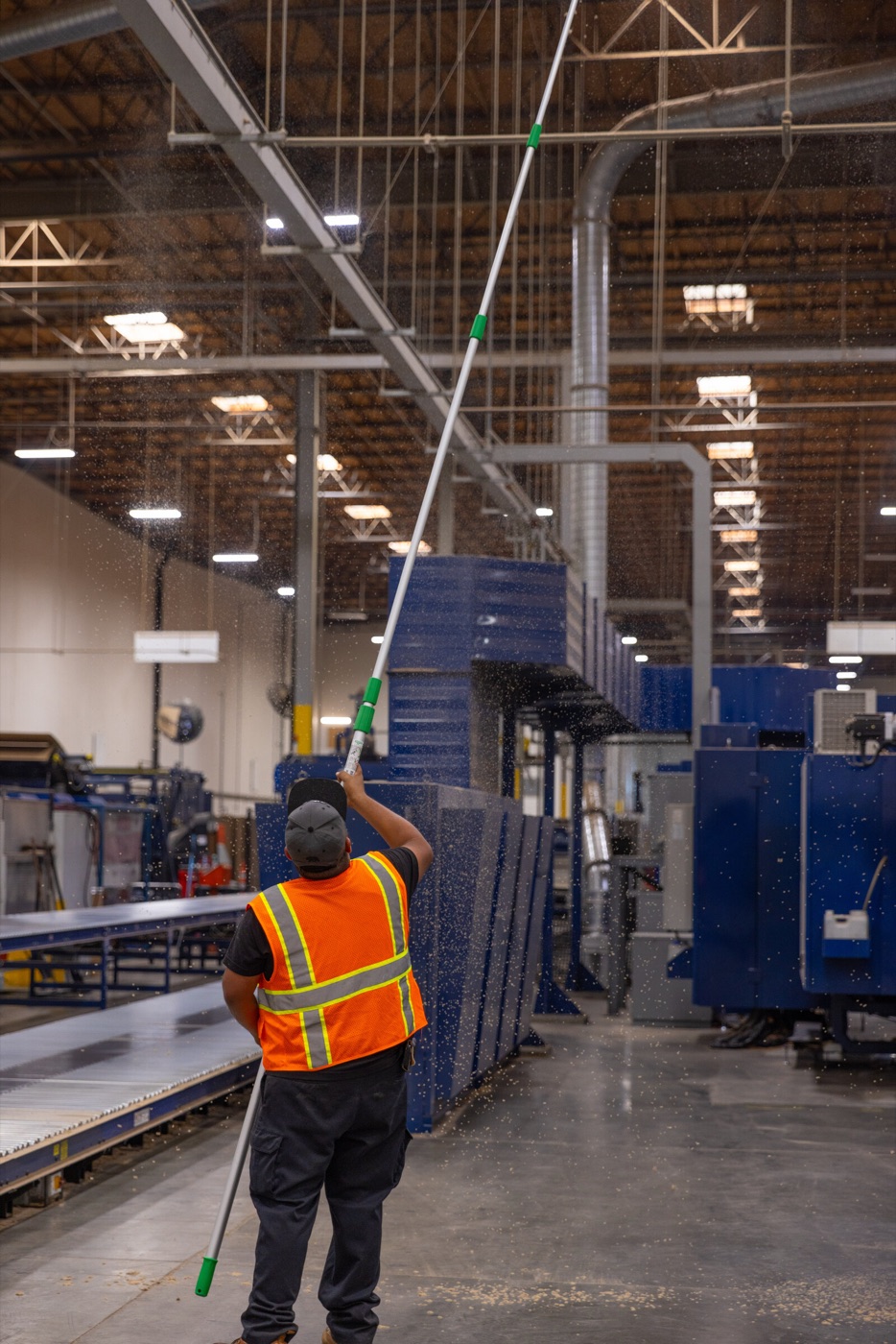 VHH technician on a lift